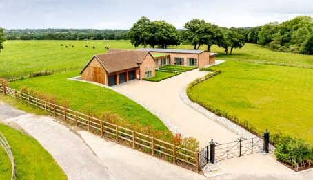 Timber frame house inn leafy environment